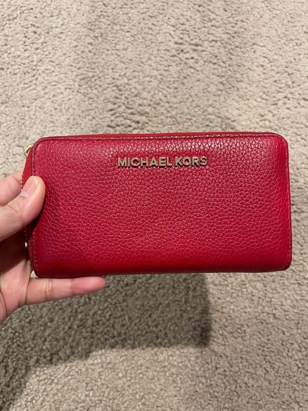 MICHAEL KKRS Red Pebbled Leather Zip Travel Wallet